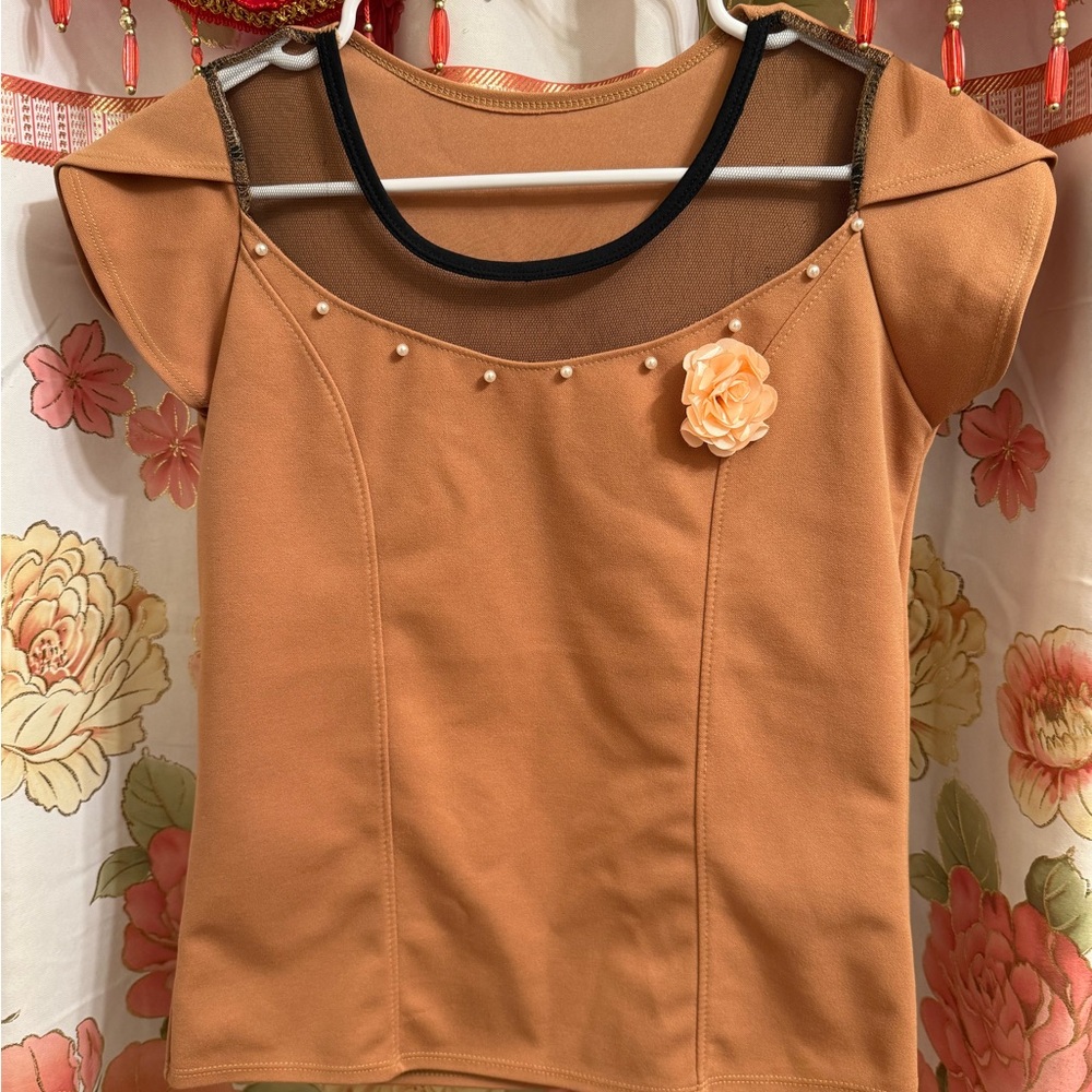 Elegant Tan Women's Top with Floral Accent